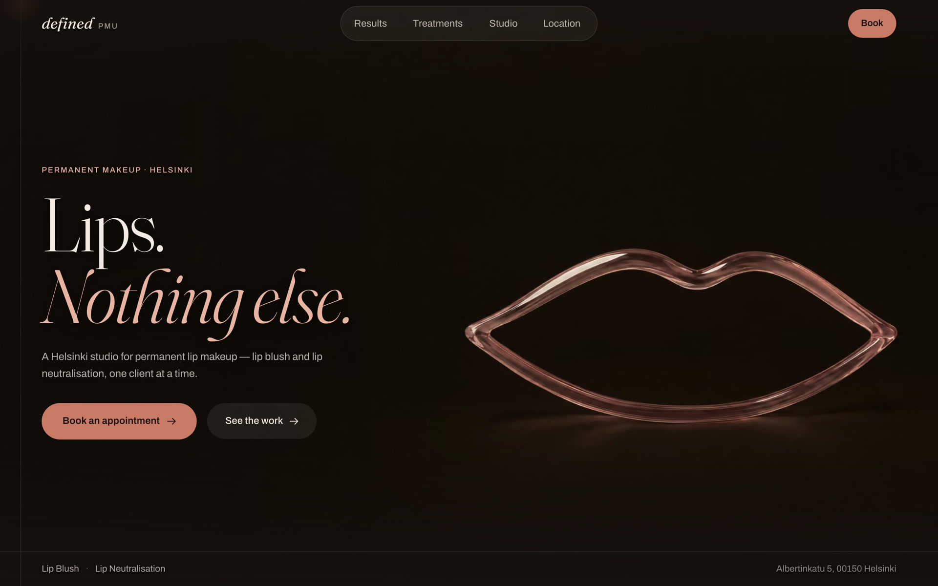 The Defined PMU home page on a desktop screen: a glass lip sculpture on a near-black background beside the headline Lips. Nothing else.